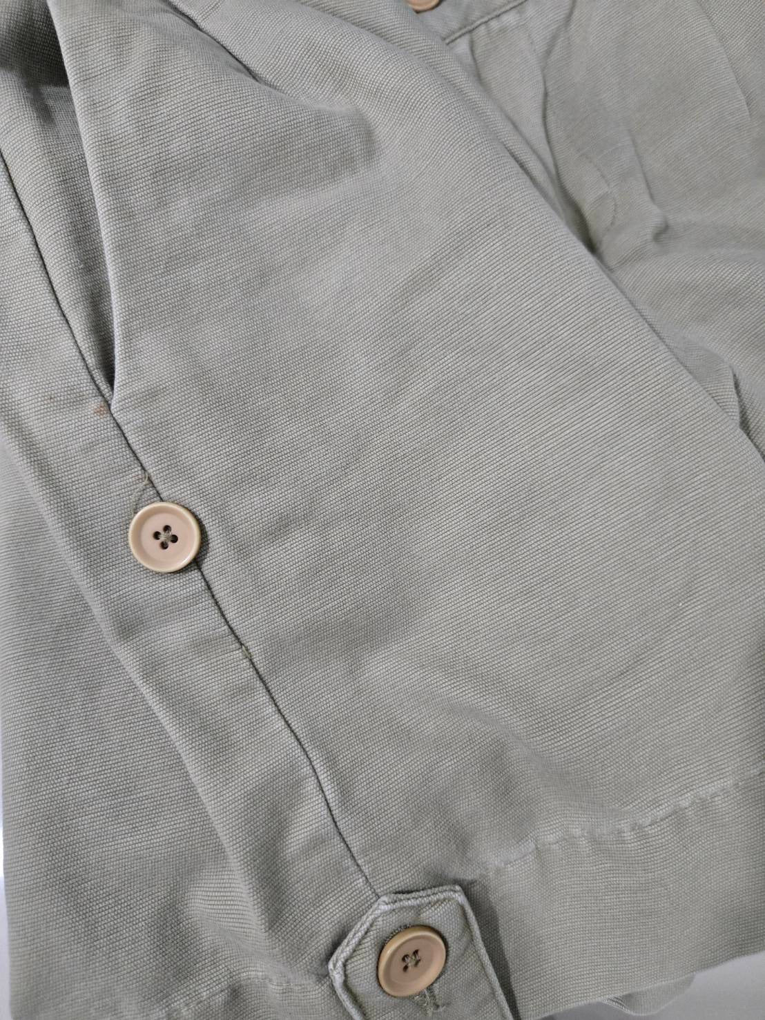 Khaki High-Waist Pleated Shorts — Button Hem Tab — Lady de Cheval