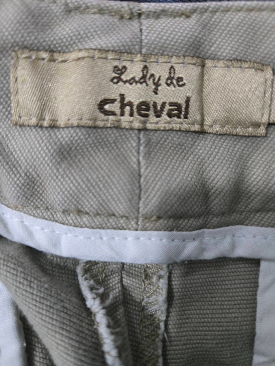 Khaki High-Waist Pleated Shorts — Button Hem Tab — Lady de Cheval
