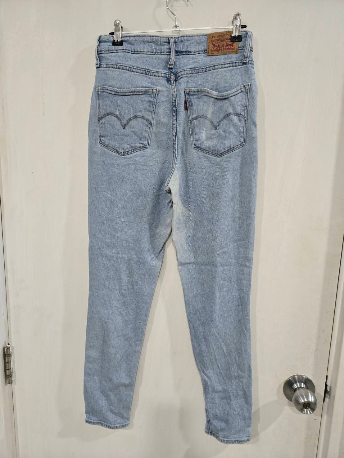 Levi's 721 High Rise Skinny Light Wash Distressed Jeans — Size 28